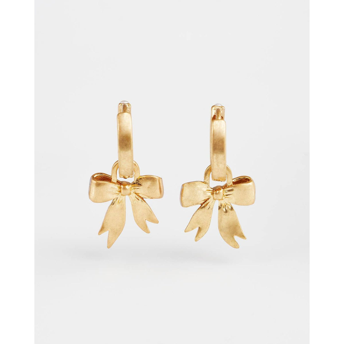Bow Pearl Huggie Earrings